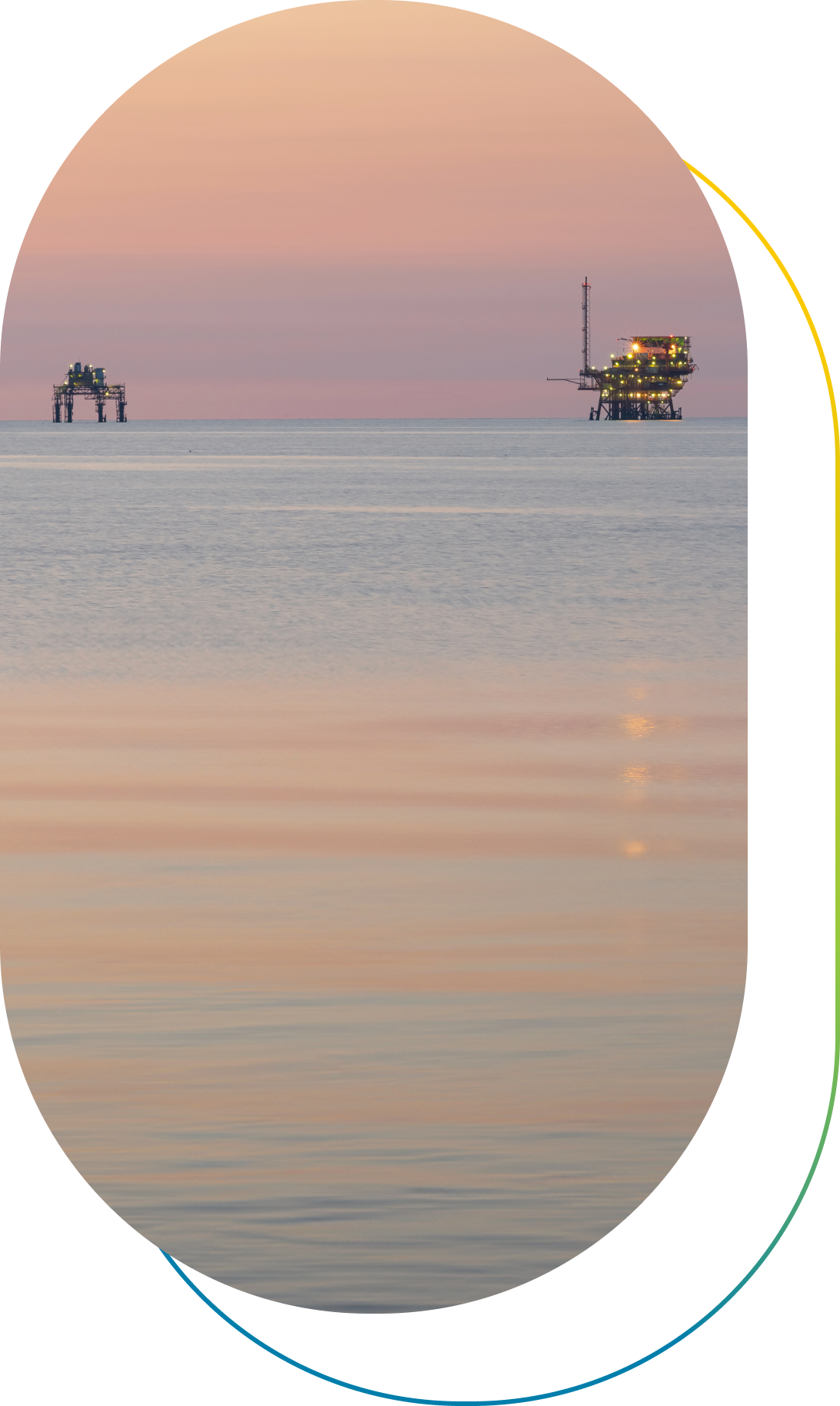 Photograph of offshore facilities off Ravenna at sunset.