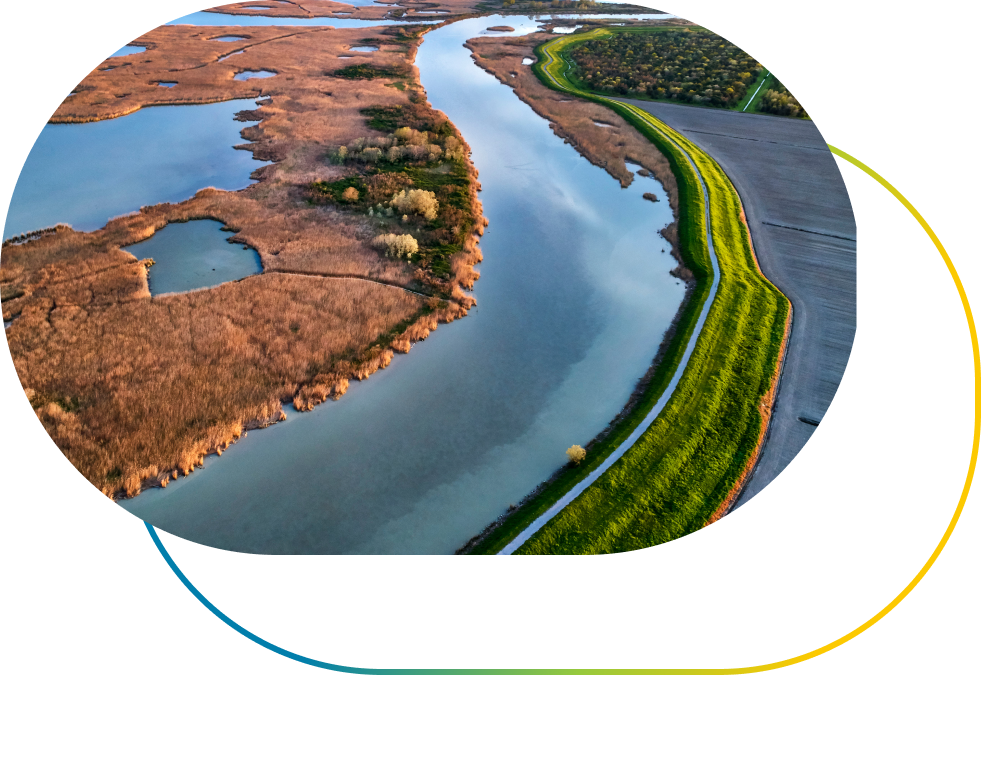 Aerial view of landscape with Ravenna river flowing into the sea